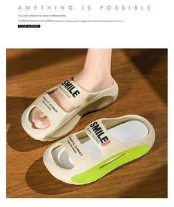 Close-up of comfortable EVA slide sandals with thick sole and smile typography detail