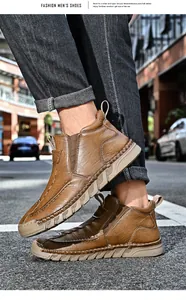 Close-up of brown leather slip-on Chelsea boots with durable soft sole for men outdoors
