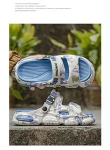 Trendy blue and white graffiti clogs with thick soles and dual-use adjustable heel straps