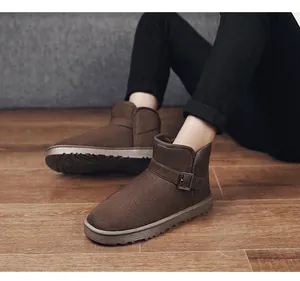 Stylish brown suede snow boots featuring side buckle detail and warm interior lining