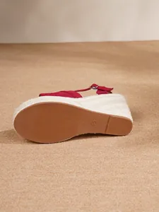 Bottom view of wine red espadrille wedge sandal showing non-slip textured rubber sole