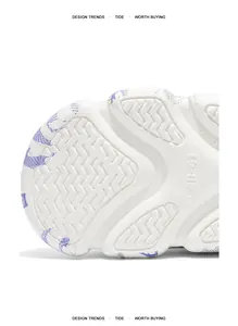 Close-up of anti-slip white shoe sole with purple patterns and 40-41 size