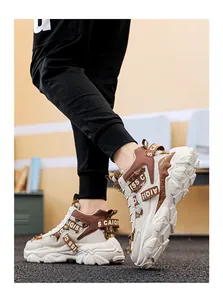 Close-up of trendy high-top basketball dad shoes with thick sole and strap design