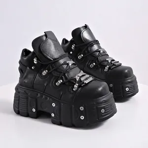 Black punk goth chunky platform shoes with silver metallic studs and tank sole design