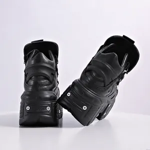 Chunky black gothic punk platform shoes with thick tank sole and metal rivet details