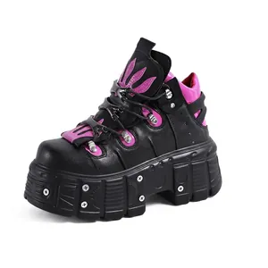 Gothic punk style platform shoes featuring metal studs and striking pink flame patterns