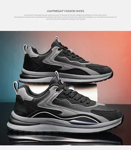 Vista laterale dettagliata delle sneakers chunky da uomo in pelle nera e grigia con suola