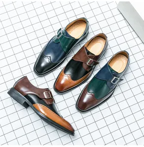 Detailed view of men's multi-color patchwork monk strap dress shoes with brogue pattern