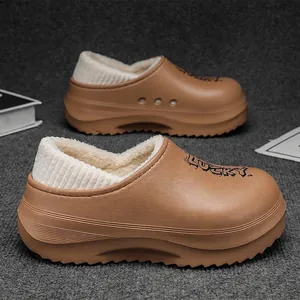 Brown fleece-lined winter clogs with thick platform soles and waterproof uppers.