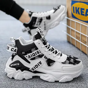 Stylish men's high-top chunky sneakers with thick platform soles and frayed fabric details.