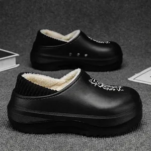 Stylish winter plush lined platform cotton clogs for men and women in solid black color