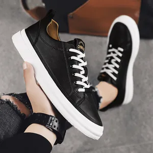 Stylish black leather men's low-top sneakers with contrasting white soles and laces