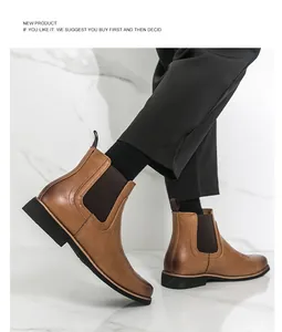 Detailansicht der braunen Leder-Brogue-Chelsea-Boots mit elastischen Seitenteilen.