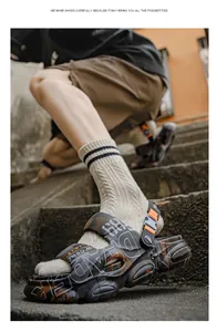 Close-up of men's trendy patterned thick-sole outdoor sandals with adjustable heel strap