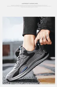 Sneakers spesse da uomo grigie e nere con superficie in pelle PU e suola alta