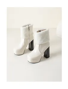Stylish white chunky heel ankle boots with plush faux fur trim and platform sole