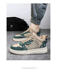 Close-up view of high-top sneakers featuring a green and beige paisley pattern design.