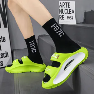 Neon green EVA platform slides for summer beach wear, showing a side view on stairs.