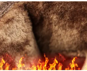 Close-up detail of thick brown faux fur plush lining in outdoor snow boots for winter warmth