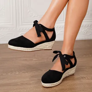 Elegantes sandalias de cuña tipo alpargata negras para mujer con cintas al tobillo con estilo