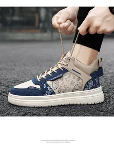 Close-up of men's paisley high-top board shoes with blue and beige color blocking.