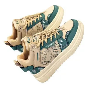 Men's stylish high-top sneakers featuring green paisley pattern and thick sole design