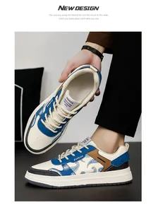Detailed view of men's leather skateboard shoes with blue paisley patterns.