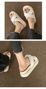 White thick-sole platform sandals with cross straps worn with denim jeans for summer