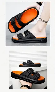 Détail de sandales de plage pour hommes à semelle épaisse avec double boucle en noir et orange