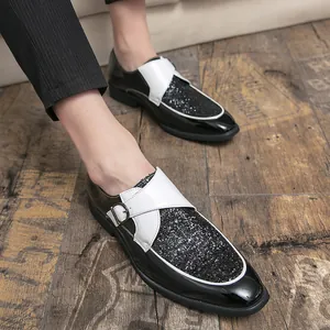 Men's British style formal leather shoes with black sequins and white monk strap detail.