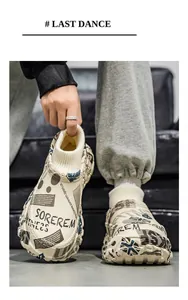 Close-up of stylish thick-soled padded cotton shoes with graffiti print and sock collar