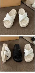 Multiple views of women's thick platform cross-strap slippers in cream and black colors