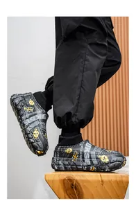Side view of black thick-soled winter cotton shoes with plush lining and sock collar.