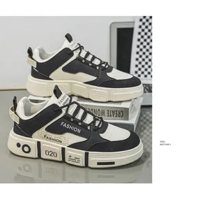 Side view detail of trendy black and white men's sneakers with thick soft soles.