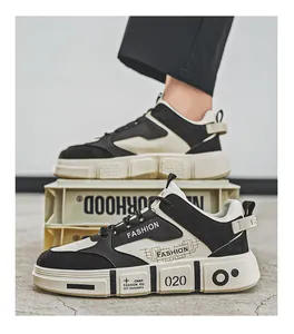 Detailed view of stylish black and white streetwear sneakers with thick soles