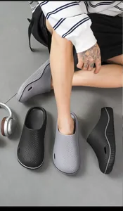 Lightweight men's waterproof clogs with non-slip texture in black and grey colors
