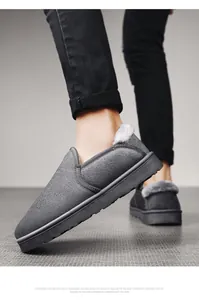 Close-up view of grey suede winter loafers featuring warm faux fur lining and anti-slip sole