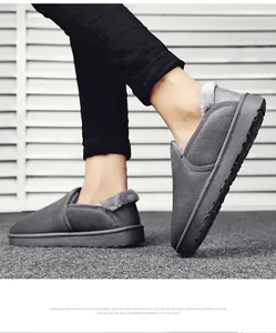 Detail showing gray suede snow boots with warm faux fur lining and slip-on design