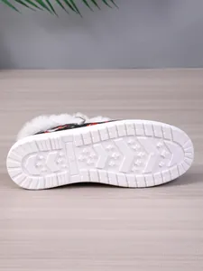 Detailed macro view of the anti-slip thick white sole of winter warm cotton boots