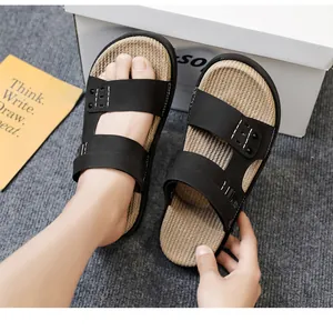 Detailed view of men's casual summer sandals featuring a woven footbed and black straps.
