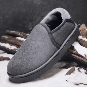 Warm grey suede slip-on snow boots with thick faux fur lining for winter outdoor use