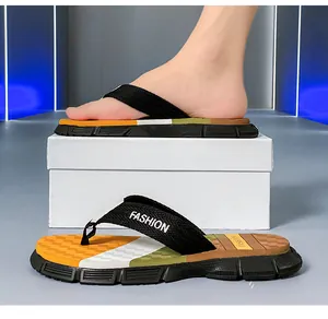 Close-up detail of stylish men's non-slip summer flip-flops featuring a vibrant, colorful sole