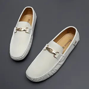 Mens off-white suede loafers with gold metal buckle detail formal driving shoes