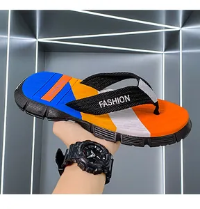 Macro detail of vibrant men's sporty flip-flops featuring anti-slip thick rubber sole