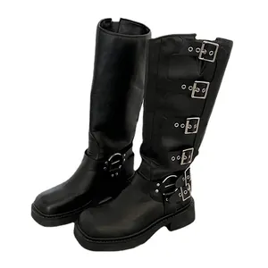 Gothic style black knee-high knight boots with multiple adjustable metal buckles