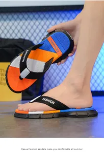Sporty men's anti-slip beach flip-flops featuring vibrant orange and blue color block