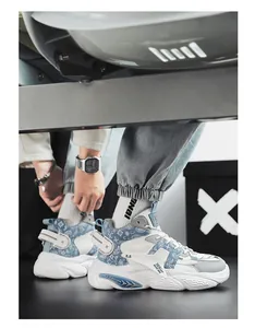 Close-up of high-top basketball sneakers with blue paisley pattern and thick sole