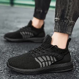 Lightweight breathable flyknit mesh running shoes for men and women on asphalt background