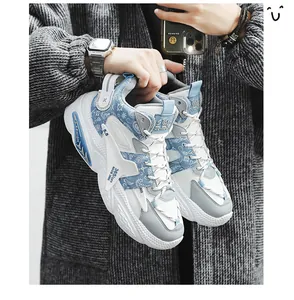 Close-up of blue and white high-top sneakers with stylish paisley pattern and bold lettering.