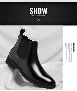 Detailed view of a classic black leather Chelsea boot for men with elastic side panel.
